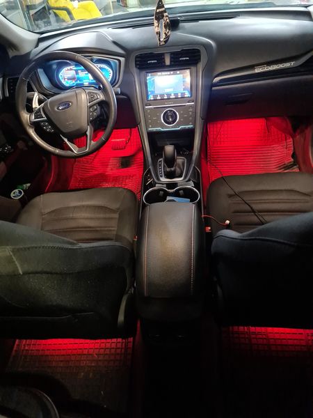 https://cslgarage.ro/stuff-to-watch/uploads/2024/06/ford-mondeo-5-lumini-ambientale-la-picioare-3.jpg – poza 3